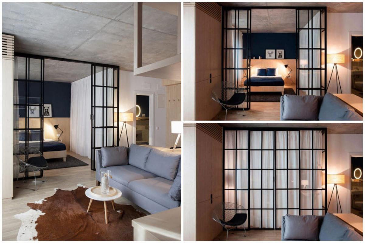 Спалнята е отделена от общото помещение посредством ефектна подвижна преграда