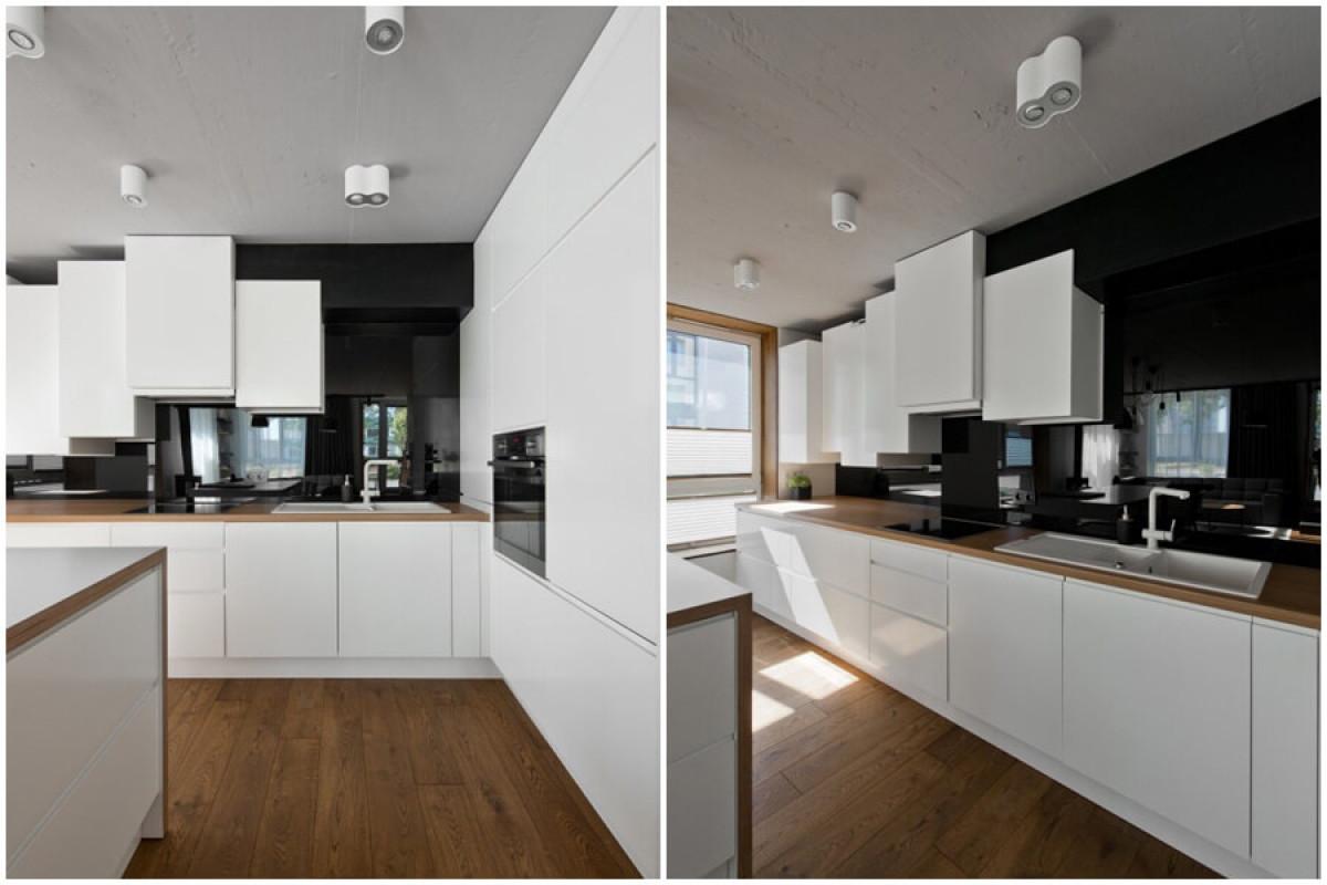 Кухнята е подчинена на изчистените линии и семплия дизайн