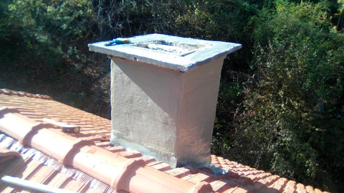 Обшиване, измазване и направа на шапка на кoмин