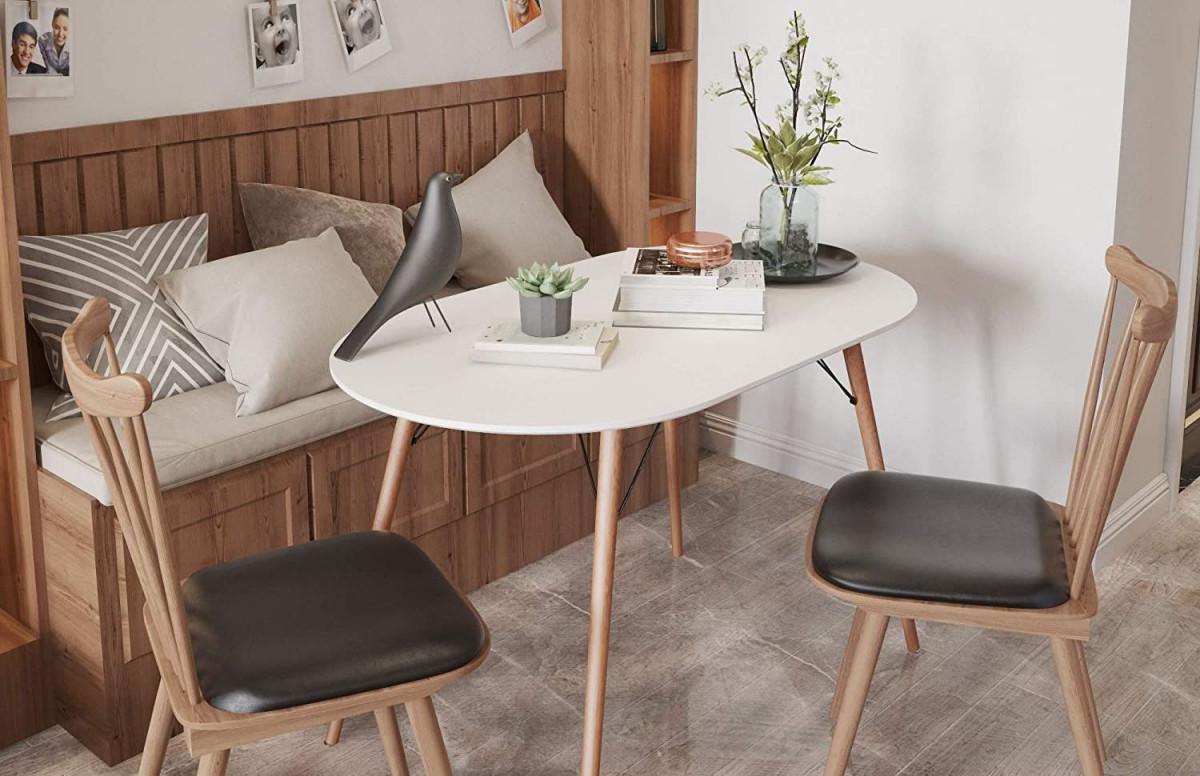 4. Компактна овална маса с бял плот