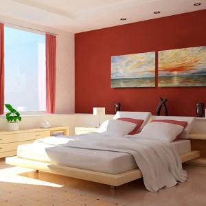 Червените елементи в спалнята трябва да се подбират внимателно