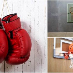 Окачете боксови ръкавици или друг спортен символ на стената