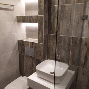 Лепене на плочки-Баня.